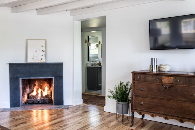 The couple renovated the fireplace with soapstone scraps.