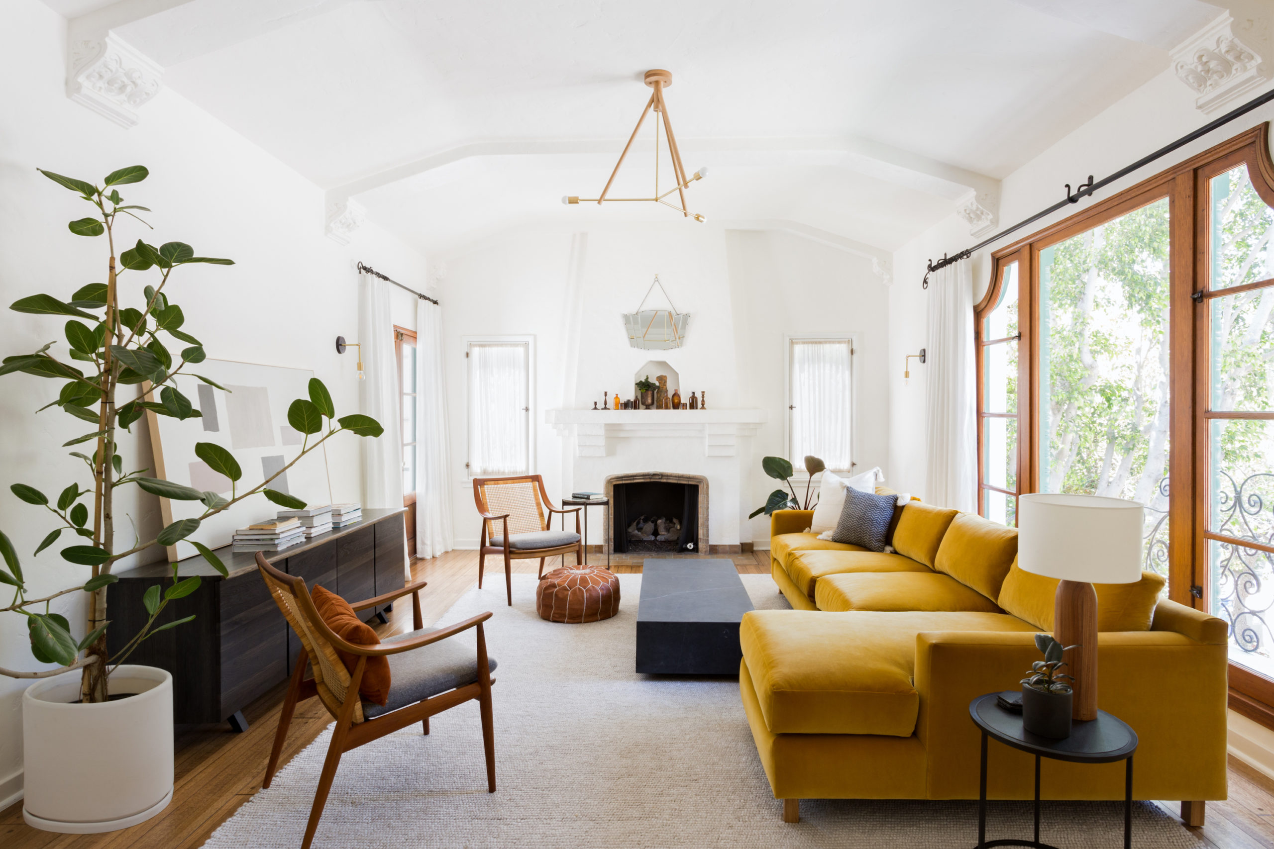 living room with mustard yellow couch