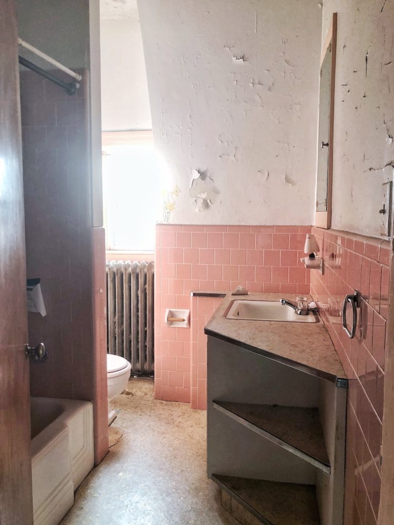 the original bathroom had pink tiles
