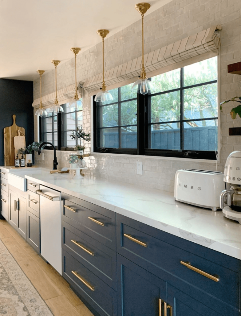Kitchen with blue Semihandmade shaker cabinets