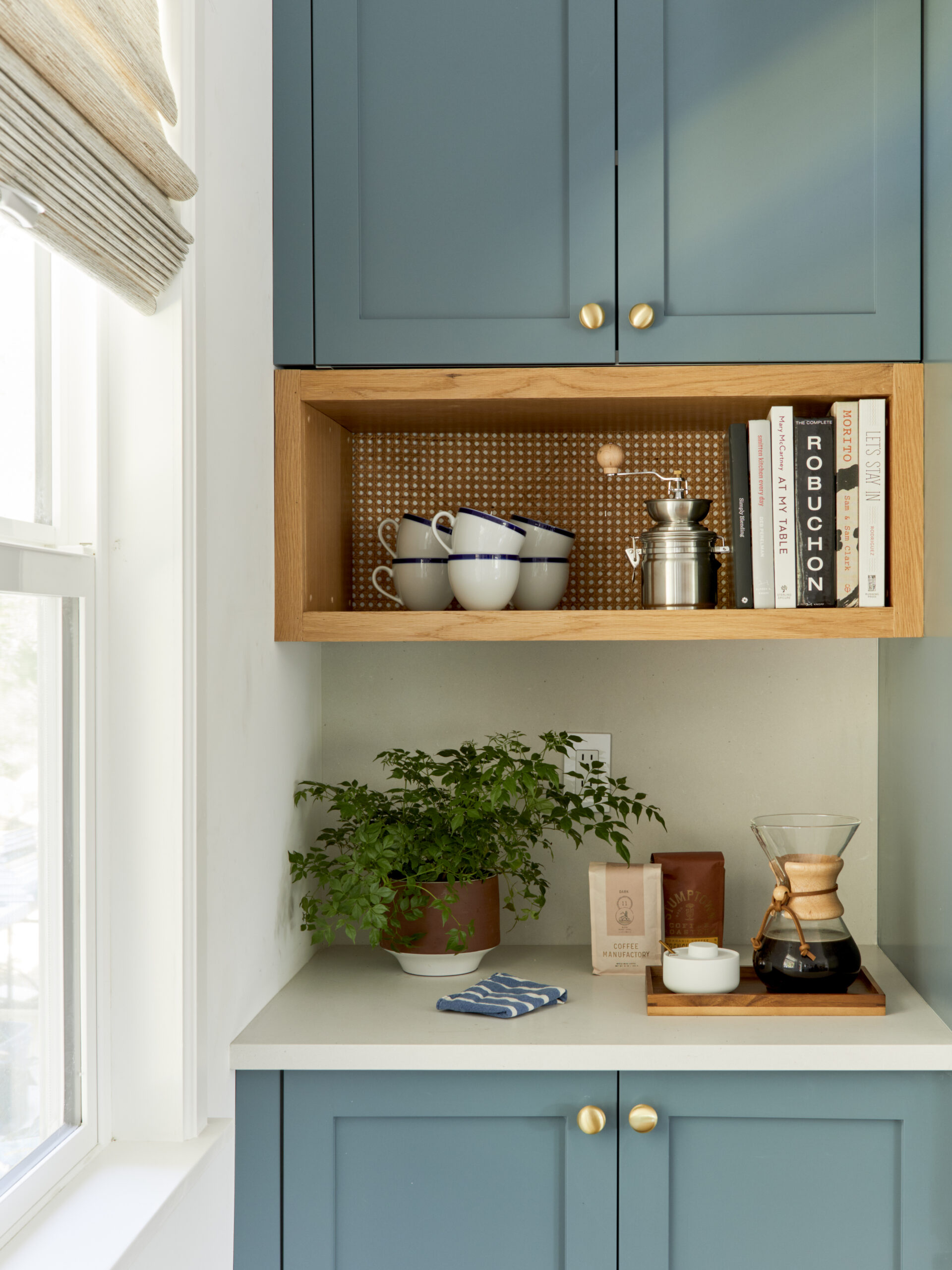 Blue-green shaker kitchen cabinets