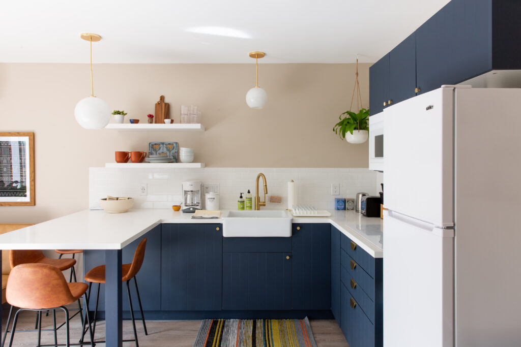 beige and navy airbnb kitchen