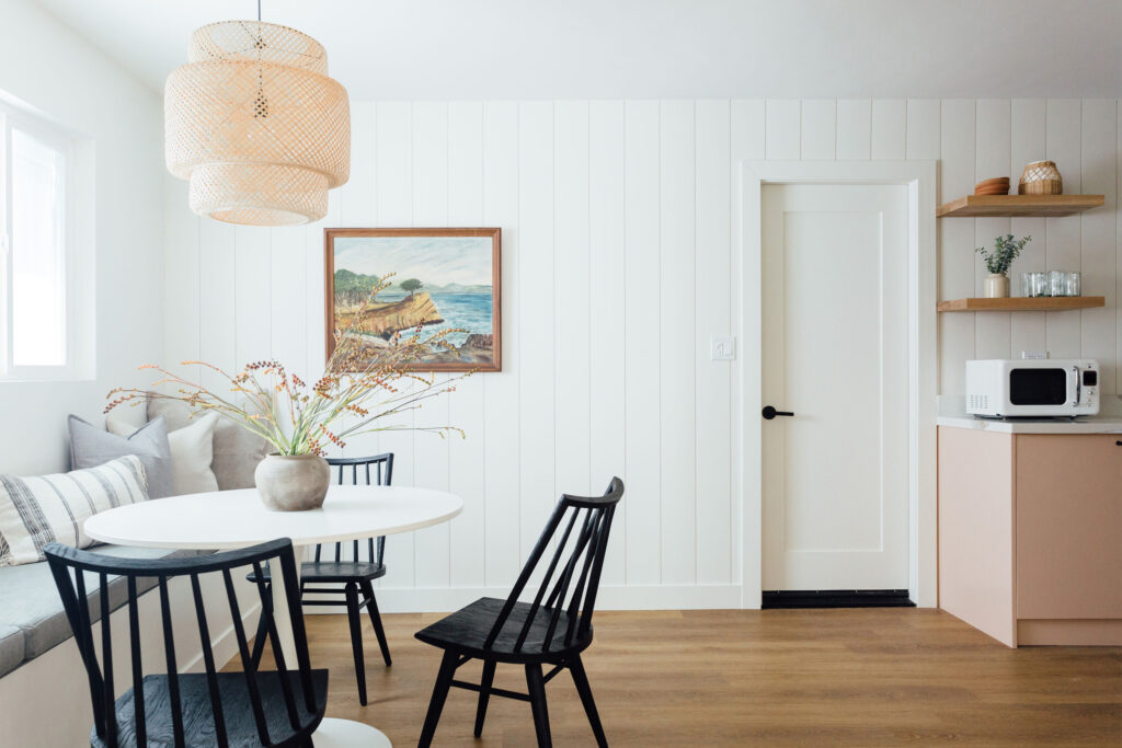 Dining area with white shiplap walls