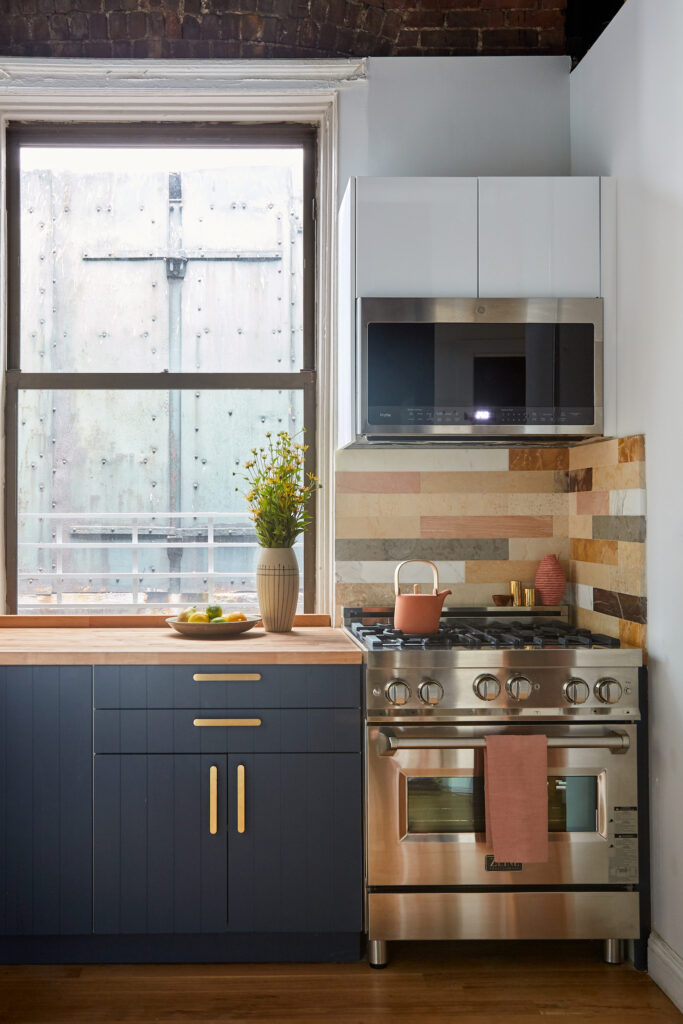 Navy kitchen cabinets in NYC loft kitchen renovation