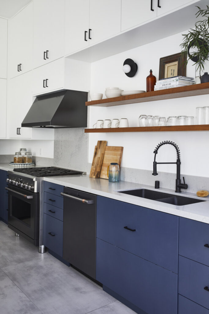 Open shelves in navy and white kitchen