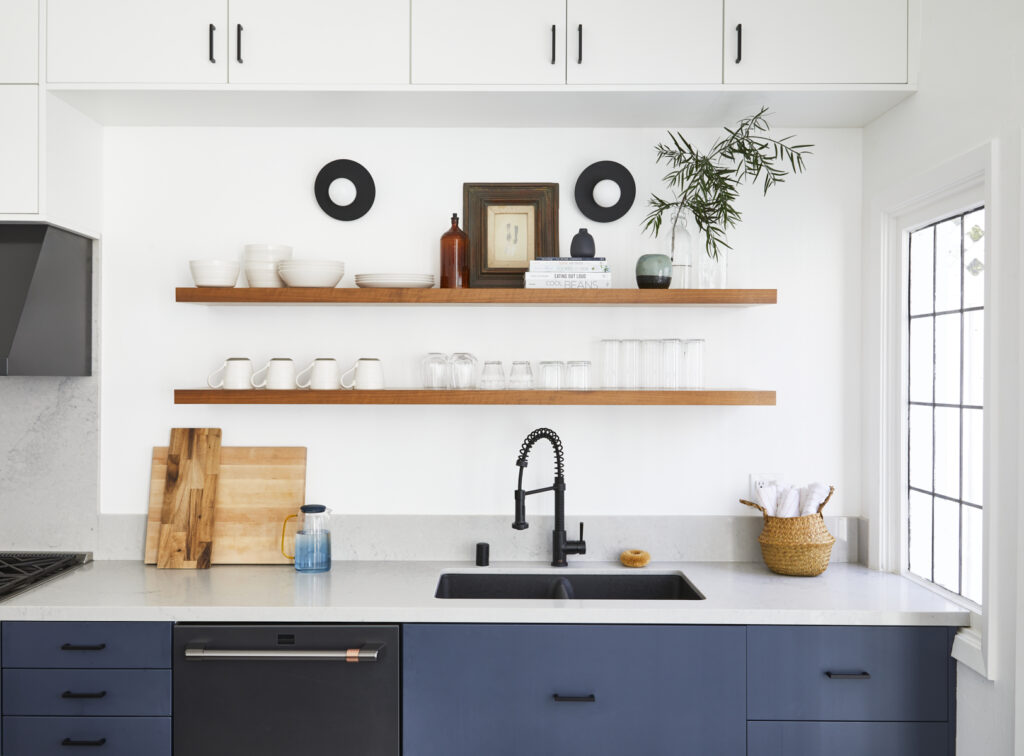 Open shelves in navy and white kitchen
