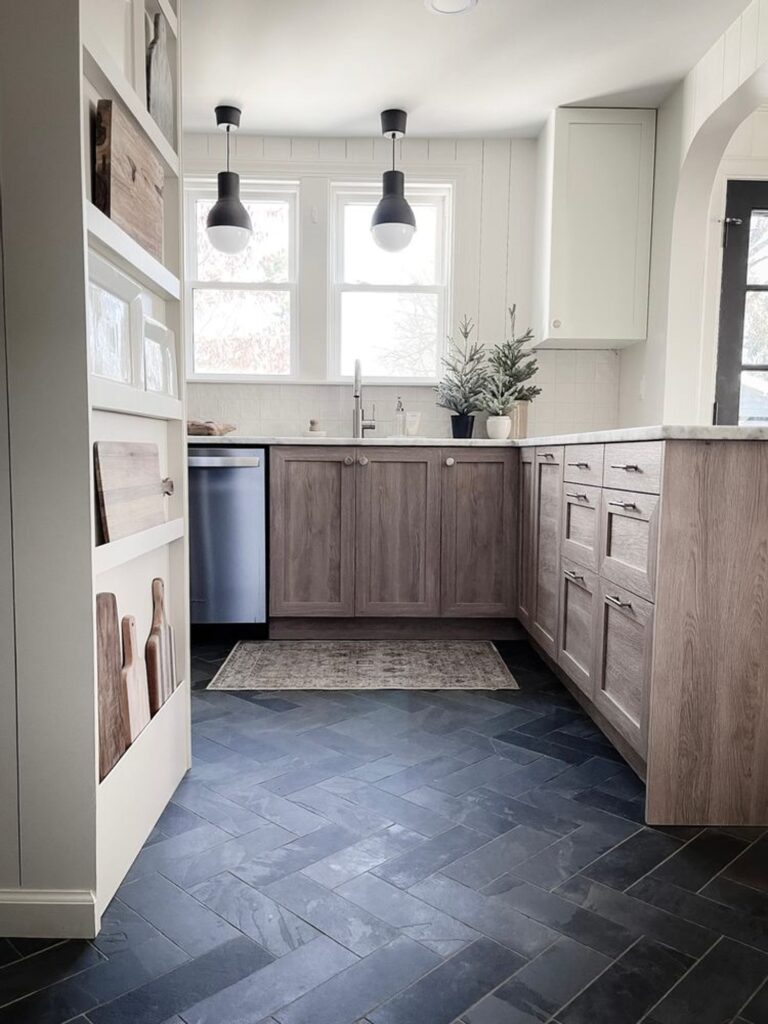 Slate gray floor white and wood kitchen