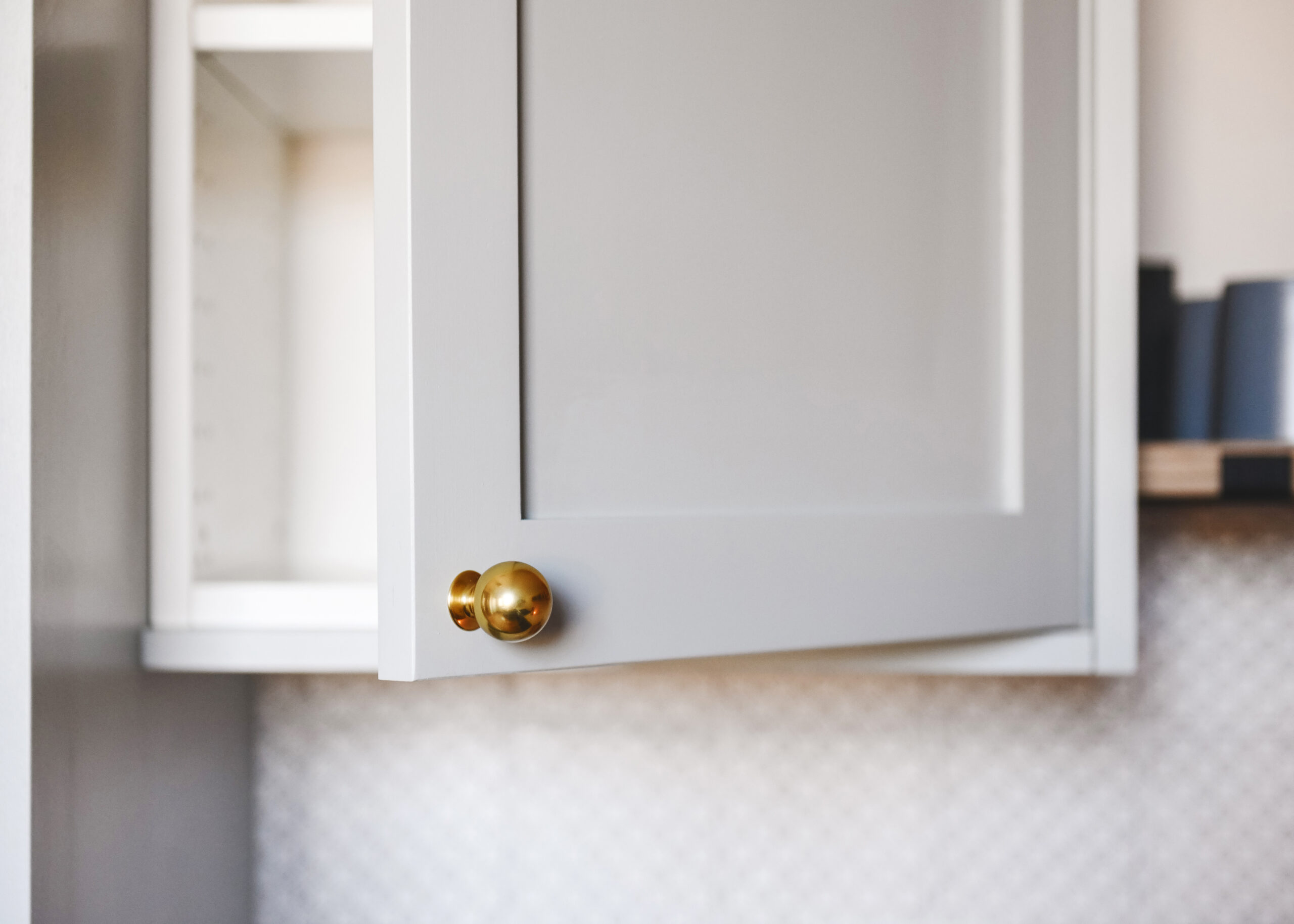 Closeup of grey kitchen cabinets