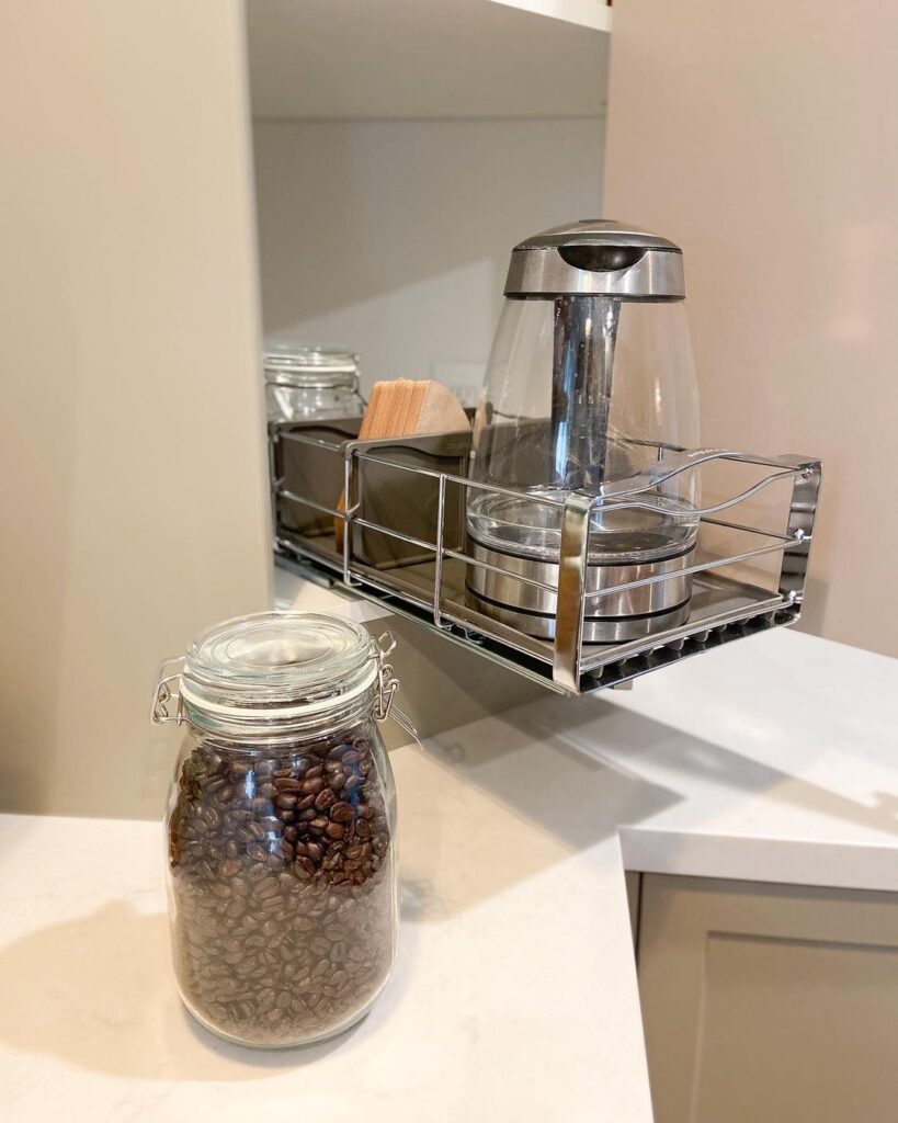 Coffee station pullout in a small corner cabinet