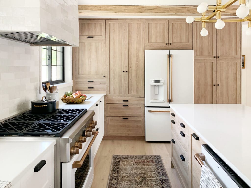 Wood and white kitchen with two pantry storage spaces