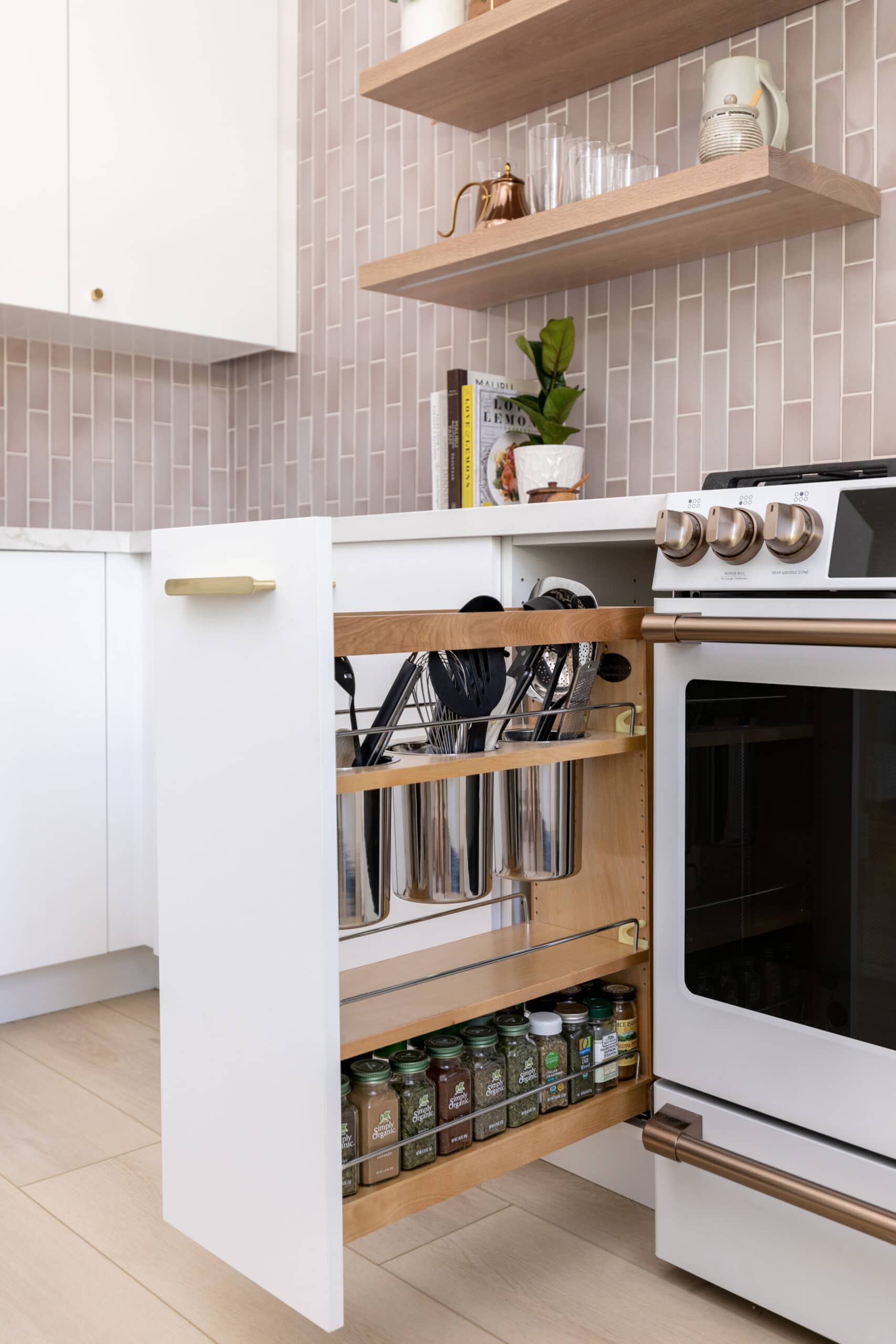 Spice pullout rack in a white kitchen