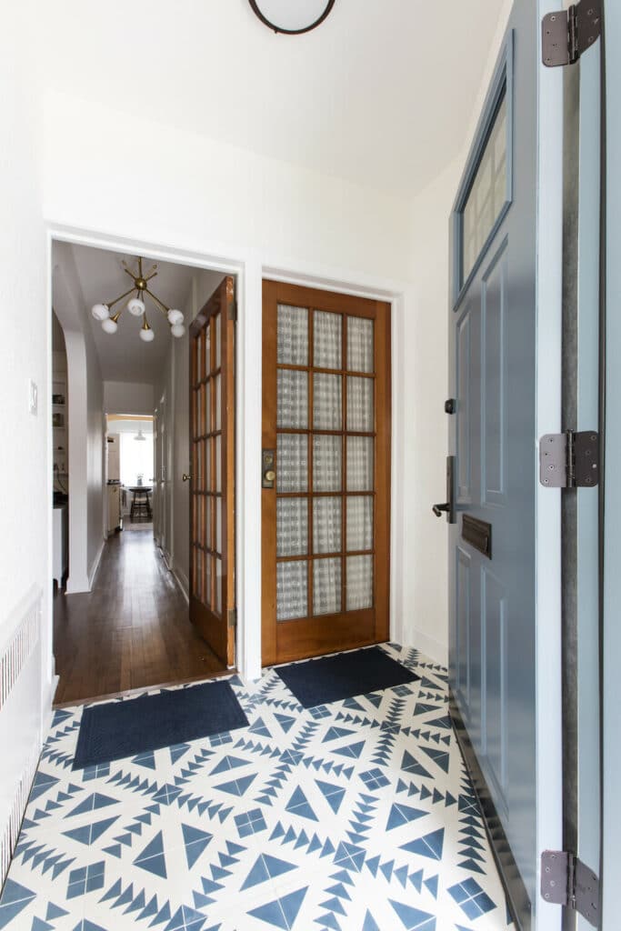 Blue and white tile entryway