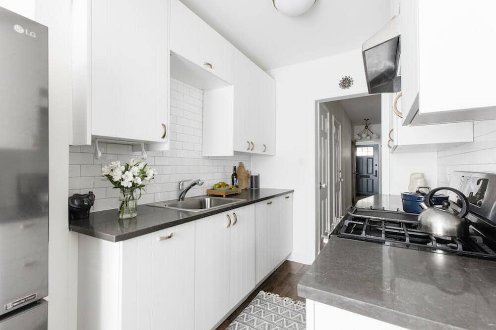 White beaded kitchen with lots of storage