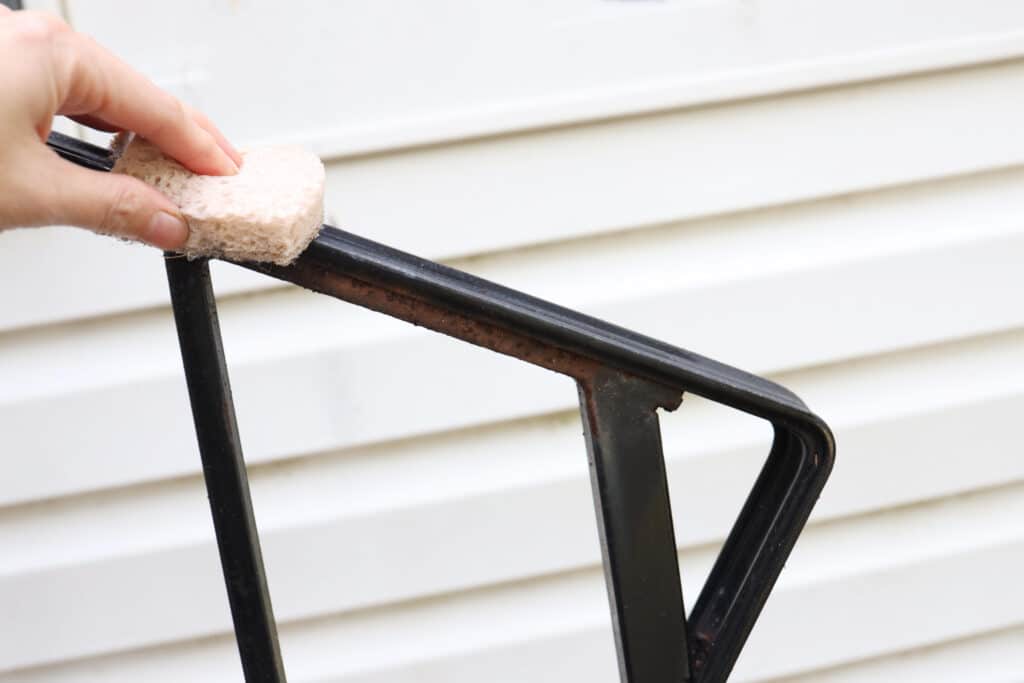 Cleaning an iron railing