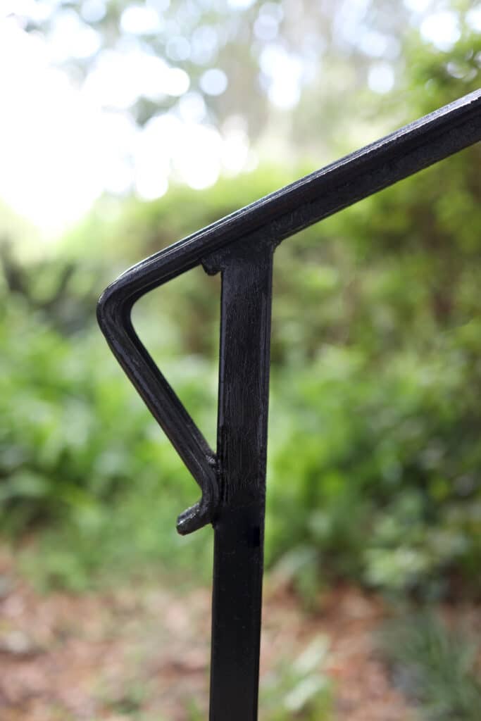 After view of a painted black railing