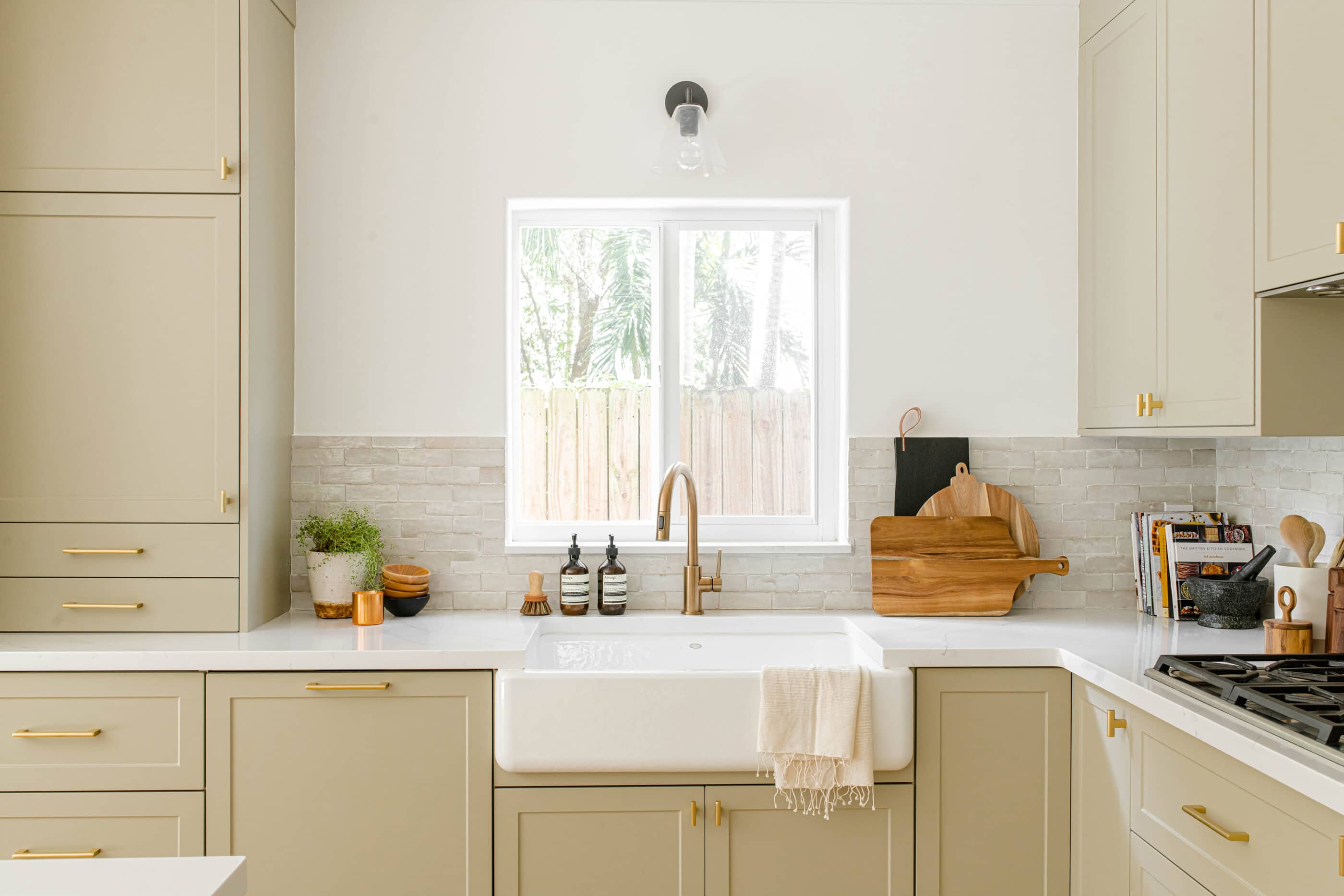 Creamy cabinet with a white farmhouse sink