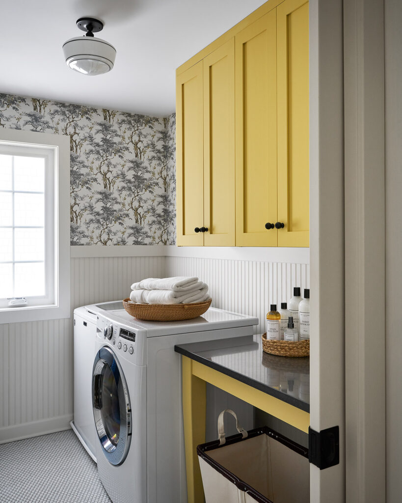 Yellow cabinets in the laundry room