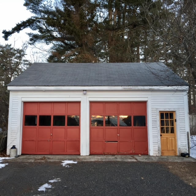 Garage before with red doors