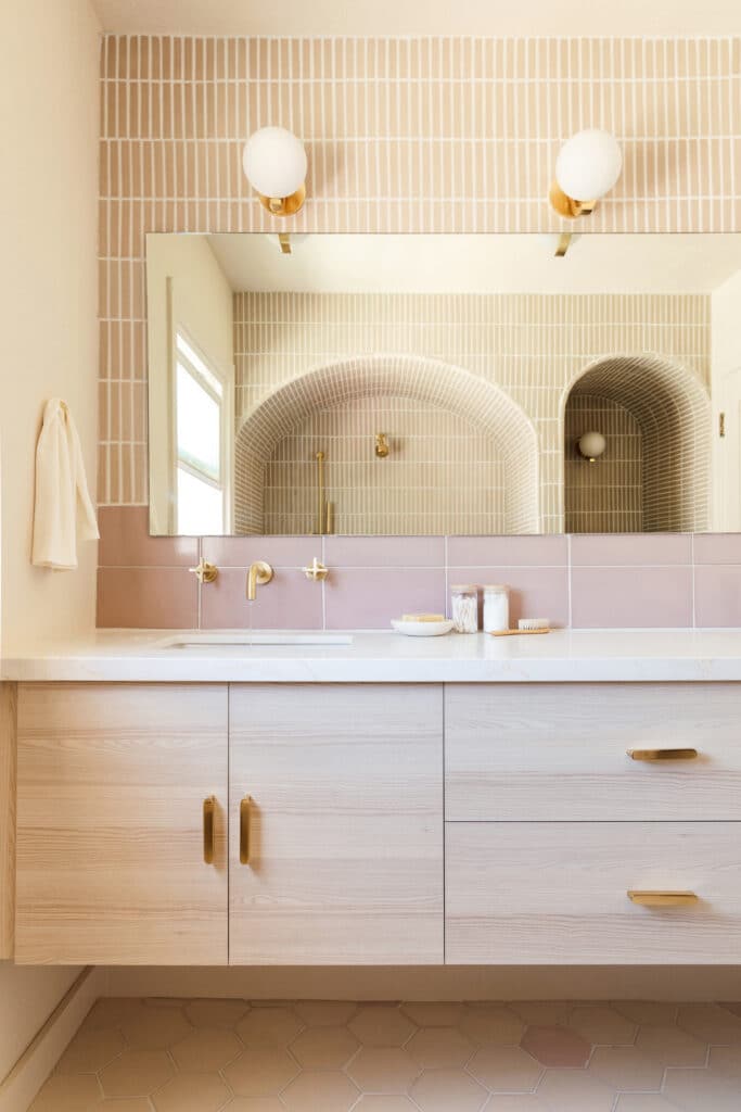 Pink retro bathroom with pink tile