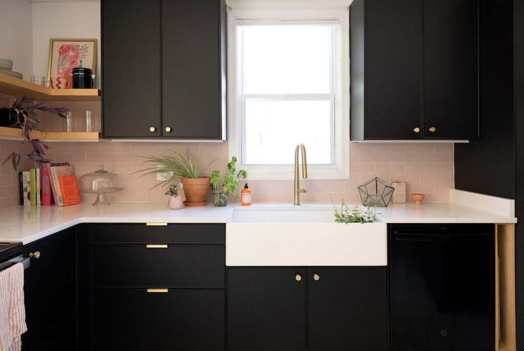 Black Kitchen Cabinets and a Bold Backsplash Modernize a 1920s Home